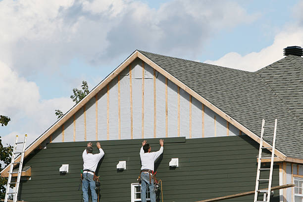 Professional Vinyl Siding technician working in North Canton, OH